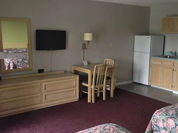 Otel Travelers Inn And Suites