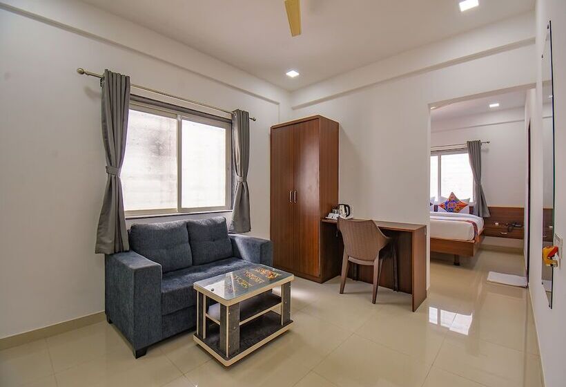 Отель Fab Fortune Suites