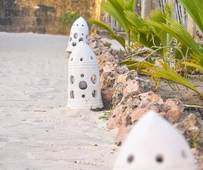 Отель Kusini Beach Villas