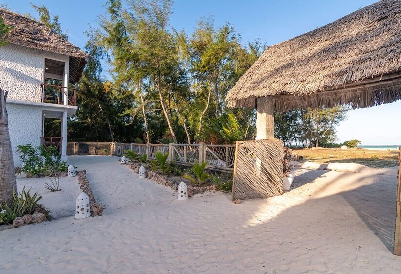 Отель Kusini Beach Villas