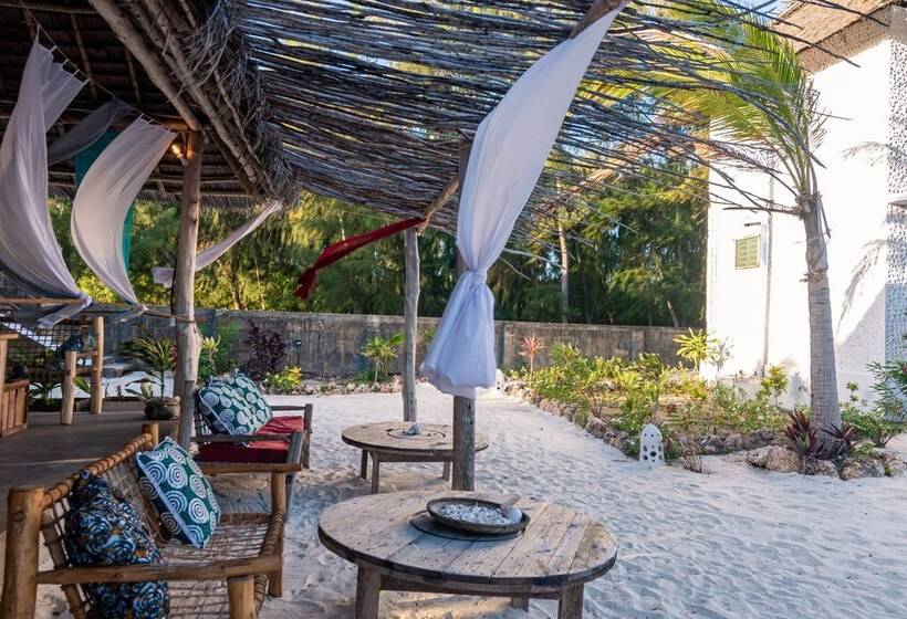 Отель Kusini Beach Villas