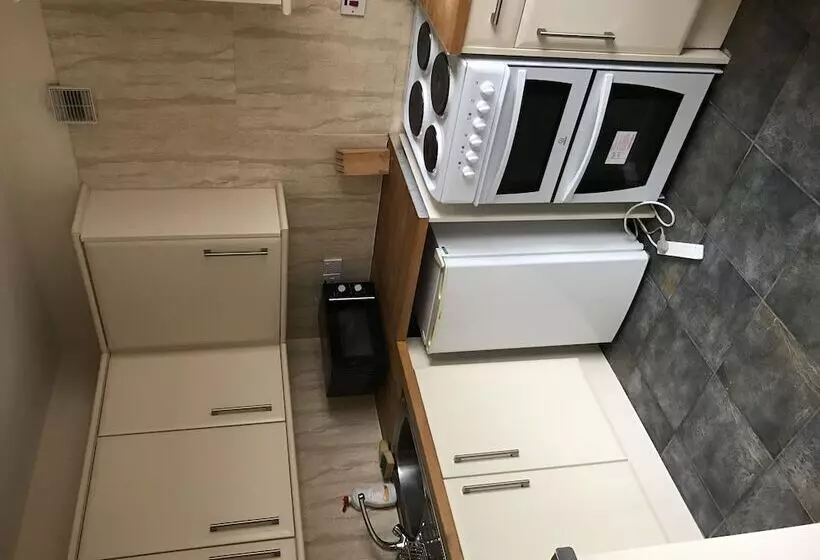 Отель Sheil Suites