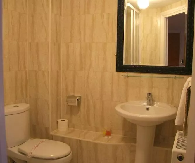 Отель Sheil Suites