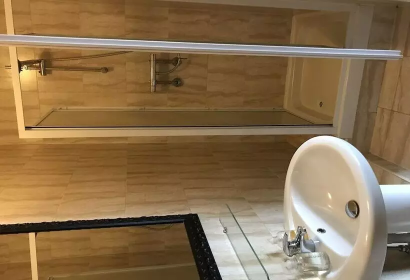 Отель Sheil Suites