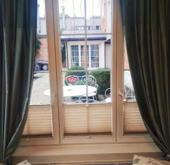 Hotelli American House Hennela