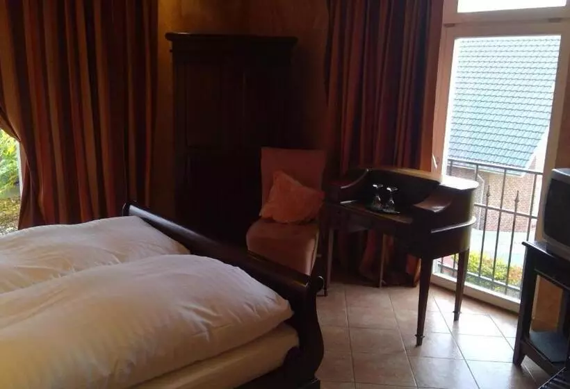 Пансион Gästehaus Chalet Ochtrup