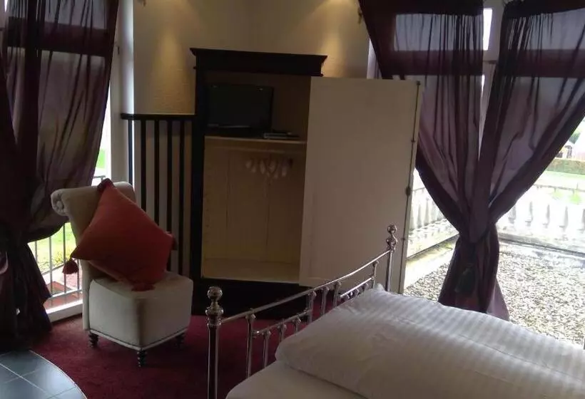 Пансион Gästehaus Chalet Ochtrup