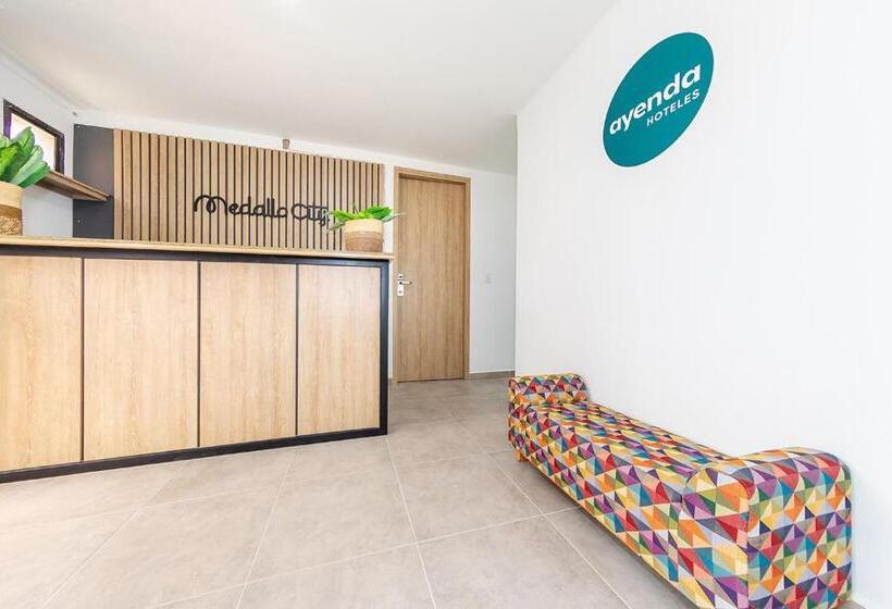 Отель Medallo City