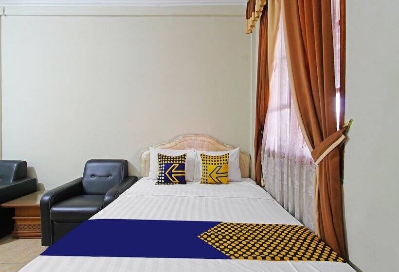 Spot On 91563 Hotel Meilias