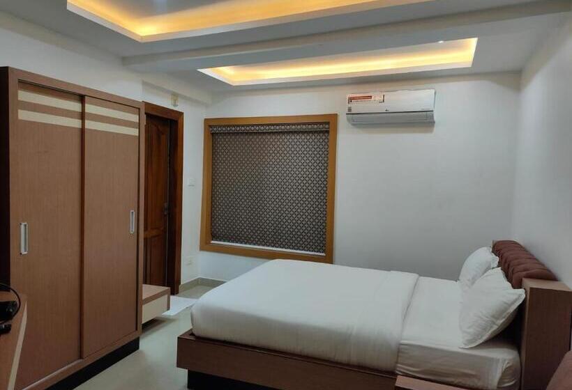 호텔 Auhtel Kannur