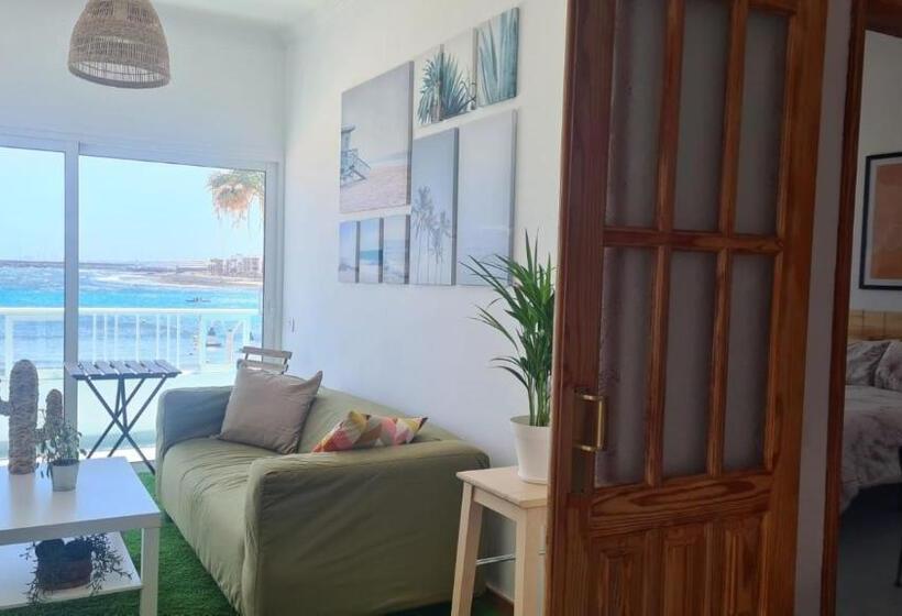 Arinaga Arena Y Mar Beach