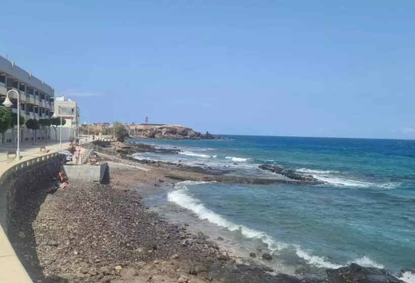 Arinaga Arena Y Mar Beach