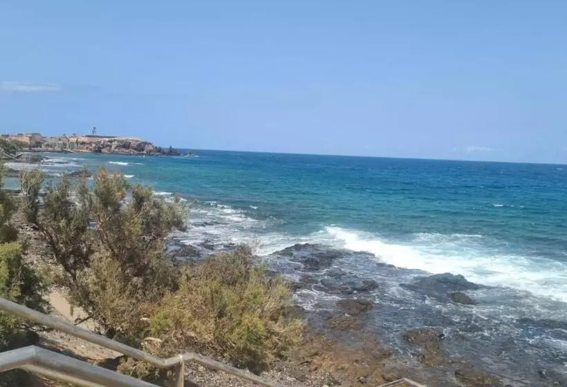 Arinaga Arena Y Mar Beach