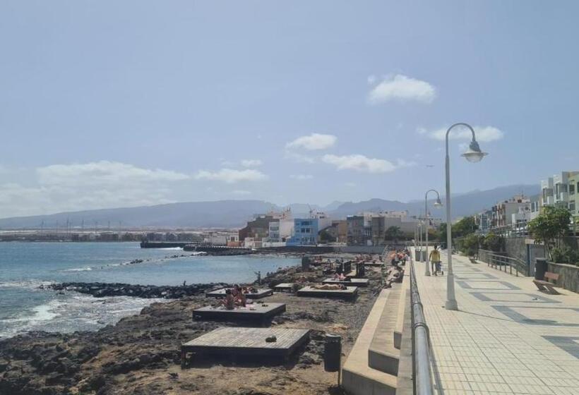 Arinaga Arena Y Mar Beach