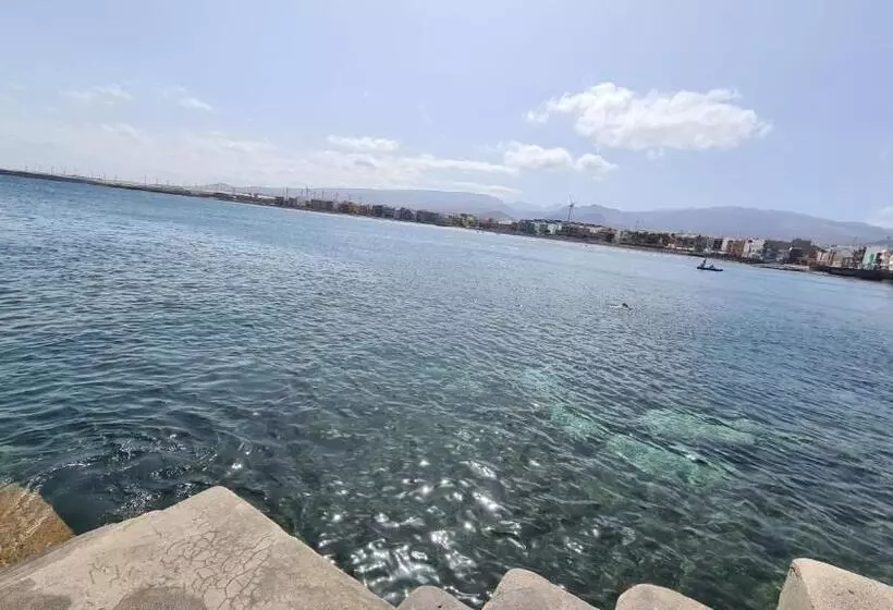 Arinaga Arena Y Mar Beach