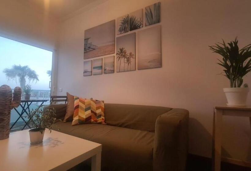 Arinaga Arena Y Mar Beach