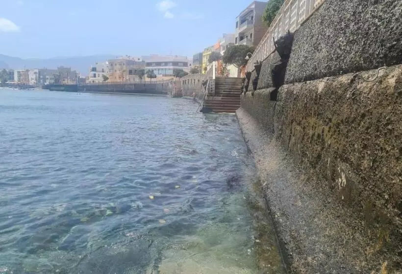 Arinaga Arena Y Mar Beach