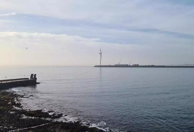 Arinaga Arena Y Mar Beach