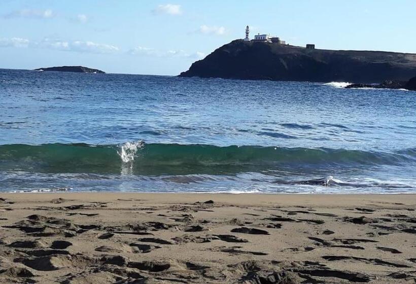 Arinaga Arena Y Mar Beach