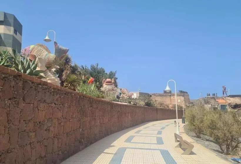 Arinaga Arena Y Mar Beach