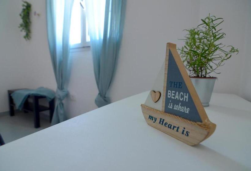 Arinaga Arena Y Mar Beach