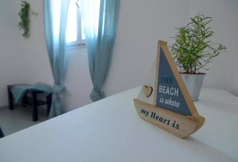 Arinaga Arena Y Mar Beach