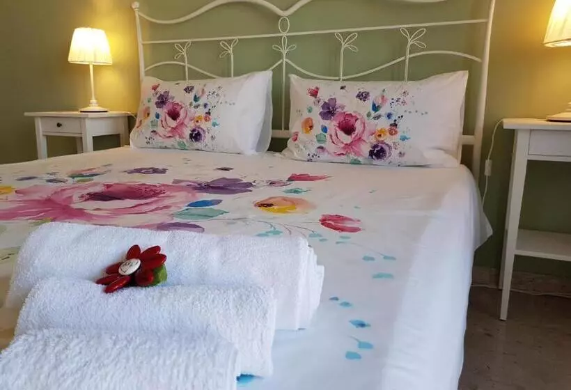 تختخواب و صبحانه Tanzi Home