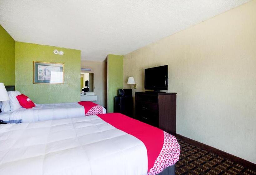 Отель Palm Court Inn & Suites