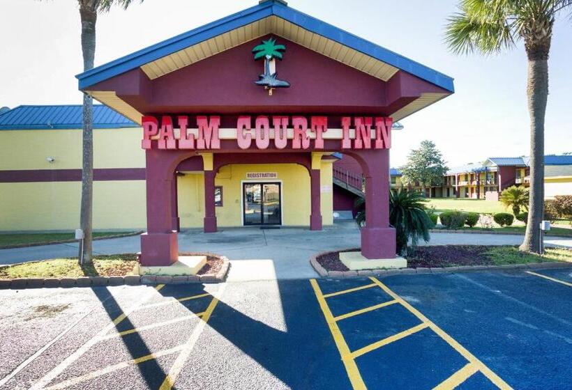 Отель Palm Court Inn & Suites