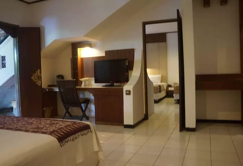 ホテル Puri Naga Beachfront Cottages