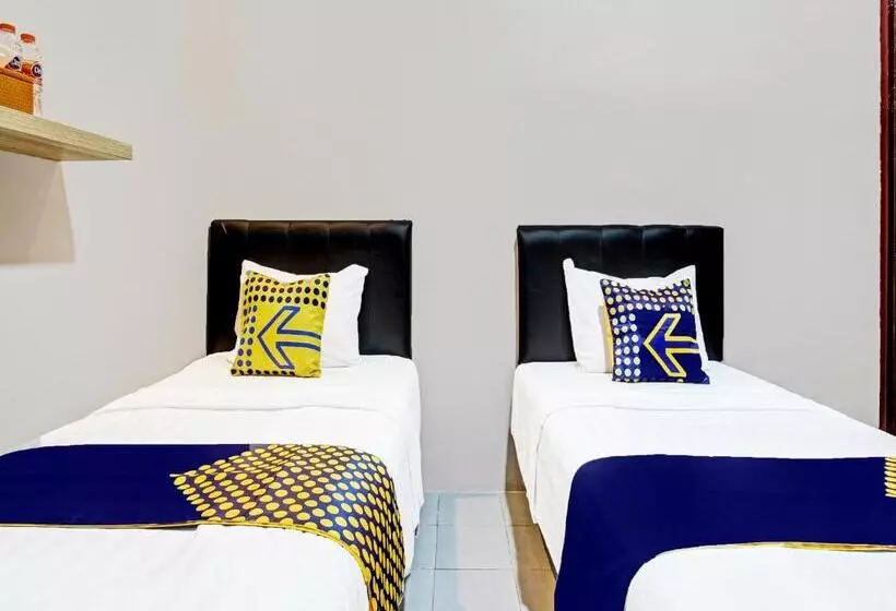 Hotelli Spot On 91932 Guest House Mustika Syariah