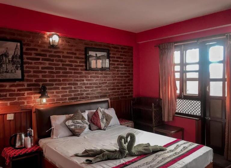 تختخواب و صبحانه New Shiva Guest House