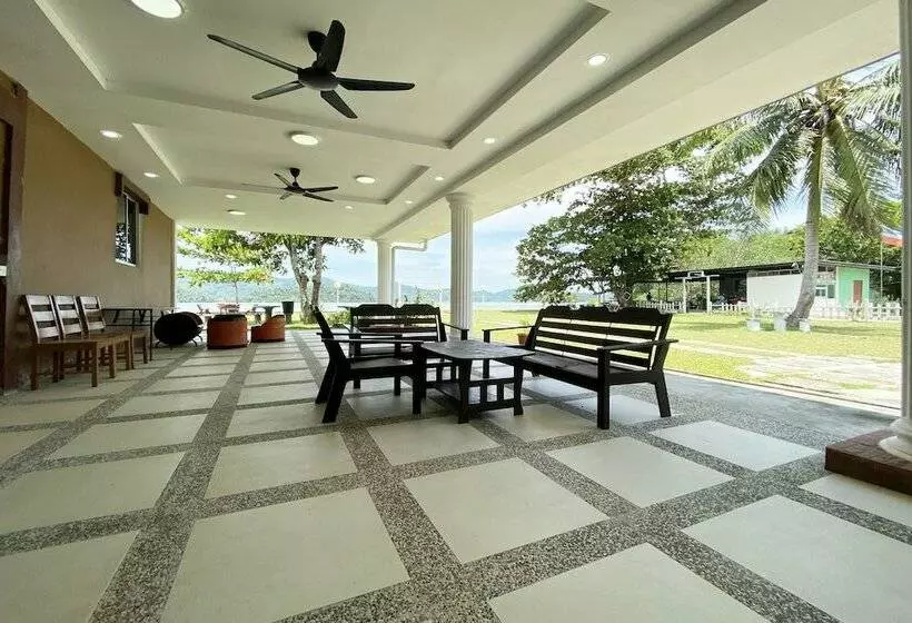 ペンション Oyo Home 90319 Ambong Bay Resthouse Homes