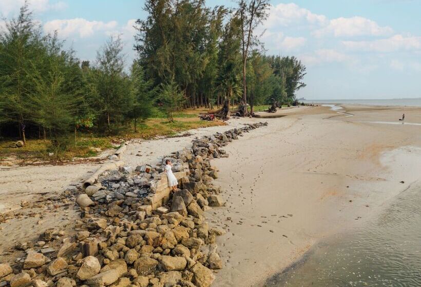 בית מלון כפרי Dugong Village Green