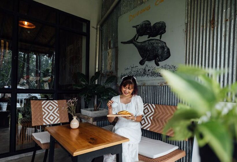 בית מלון כפרי Dugong Village Green