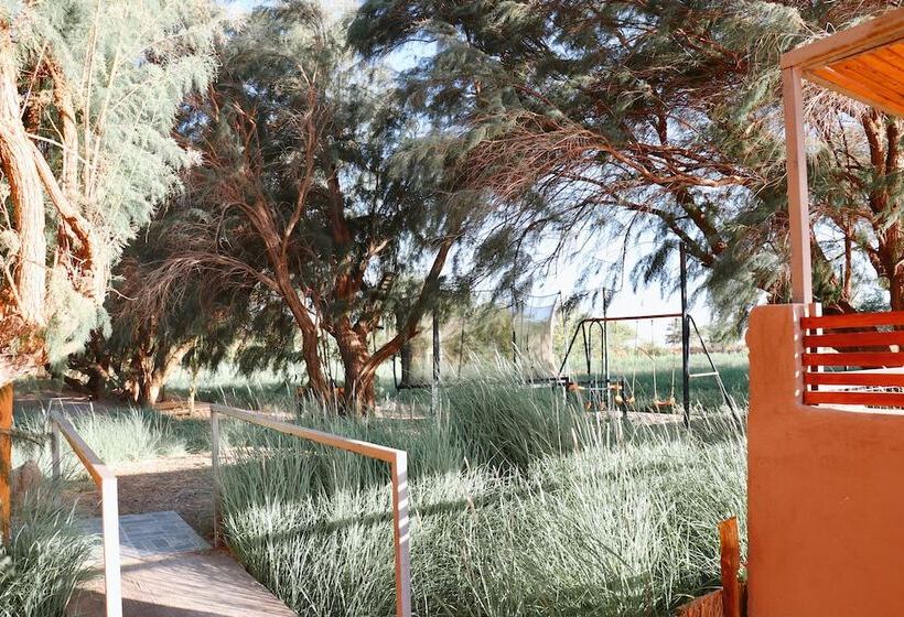 Peumayen Atacama / Hostal & Cabaña