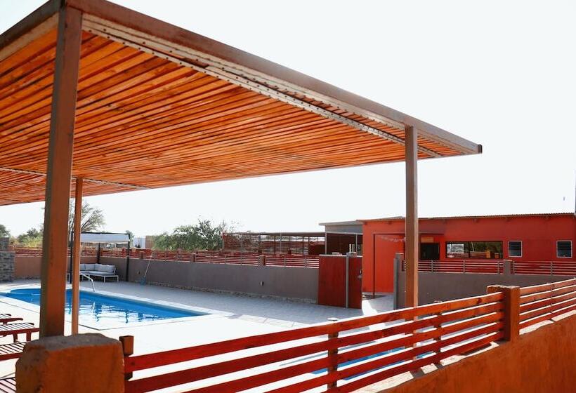 Peumayen Atacama / Hostal & Cabaña