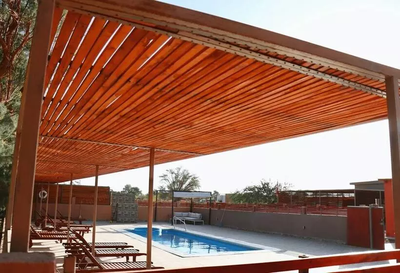 Peumayen Atacama / Hostal & Cabaña