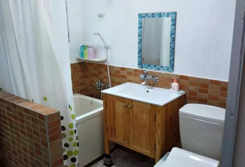 Отель Holiday House Ryukyu An Music Hostel