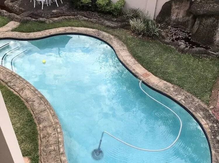 פנסיון Global Village Guesthouse