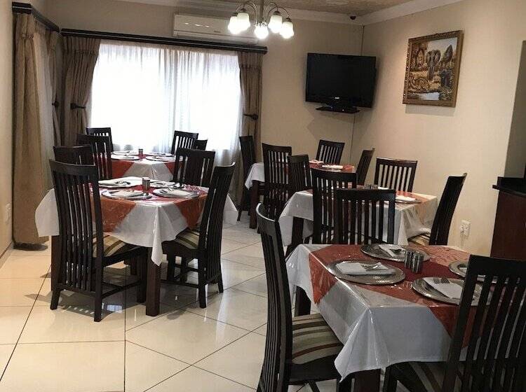 פנסיון Global Village Guesthouse