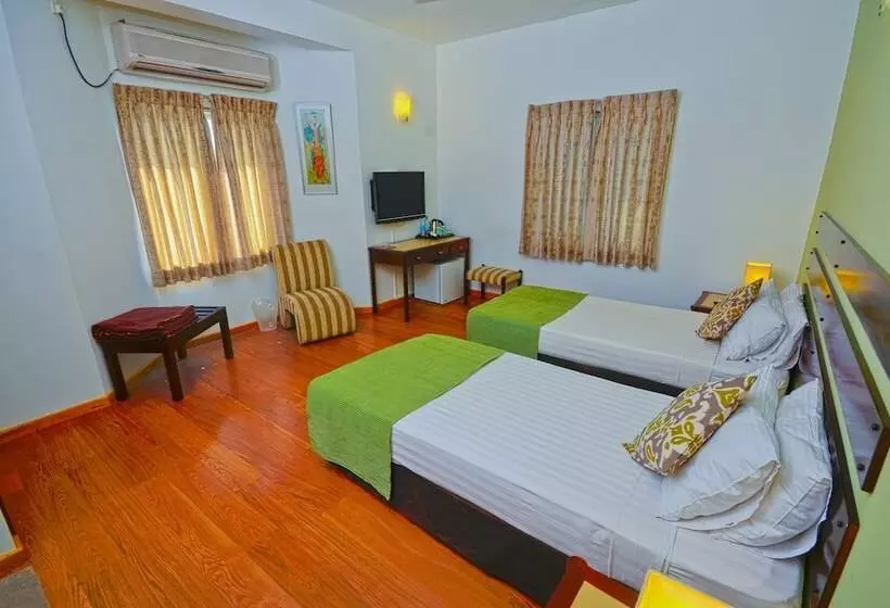 تختخواب و صبحانه Monsoon Suites