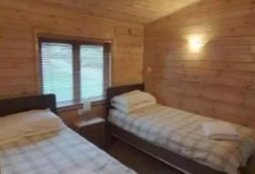 The Log Cabin Glebe Farm