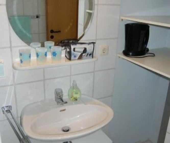 호텔 Pension Strohm Im Lieth Café