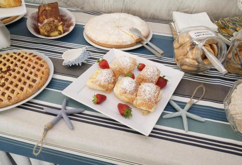 בית מלון כפרי Tosi