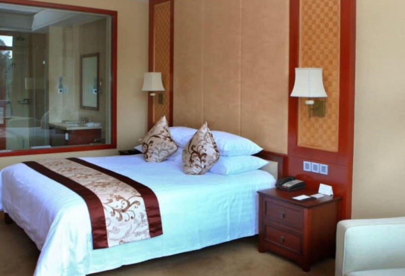 Отель New Century Resort & Spa Puer