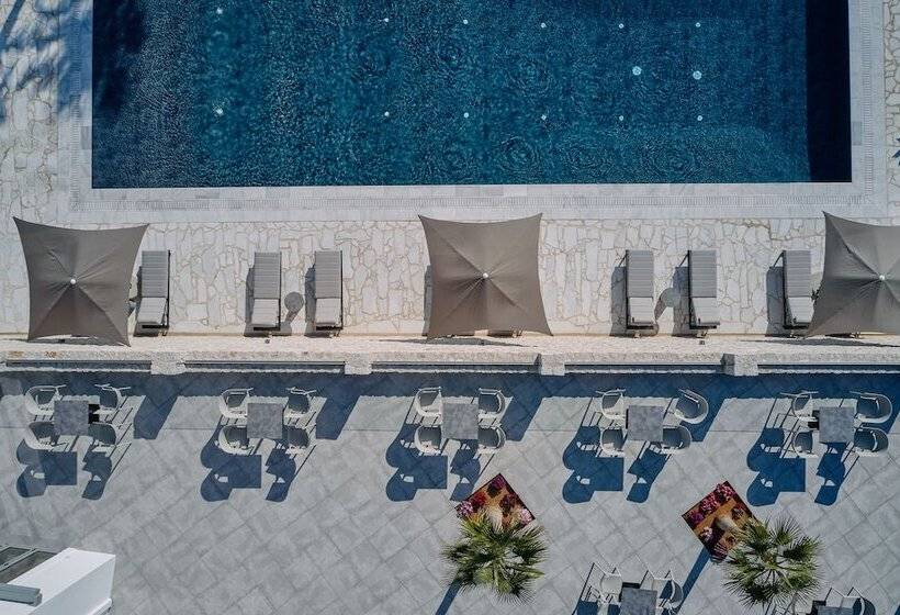 Отель Quattro Suites