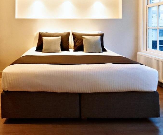 Отель Ams Suites