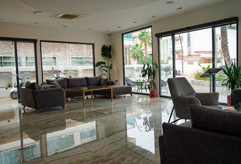 Отель The Ivy Suites