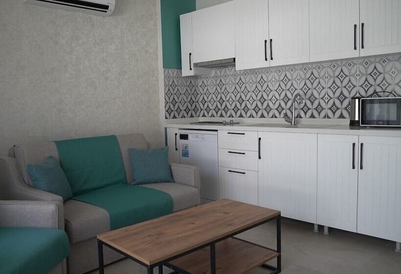 Отель The Ivy Suites